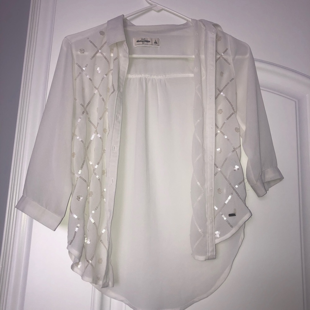Abercrombie kids white blouse with sequence.